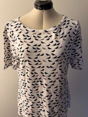Women`s short Top a blue bird